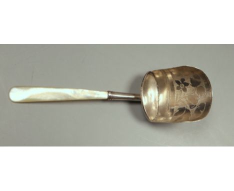 A George III mother of pearl handled silver caddy spoon, Joseph Taylor, Birmingham, 1817, 99mm.CONDITION: Repair to the handl