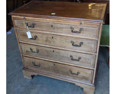 An Edwardian Georgian style mahogany chest with brushing slide and four graduated long drawers, on bracket feet, width 87cmCO