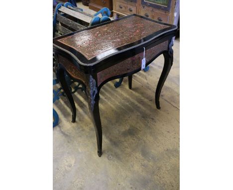 A 19th century French red boullework and ebony card table, with serpentine top, width 74cmCONDITION: Overall in bright shiny 