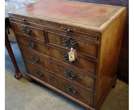 A George I walnut chest, with brushing slide, two short and three graduated long drawers, width 82cmCONDITION: Top has a late