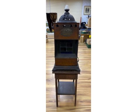 A Rippingille's Patent ABC Stove, Albion Lamp Co., oxidised copper frame, with leaded stained glass panel, circa 1860, 64cm h