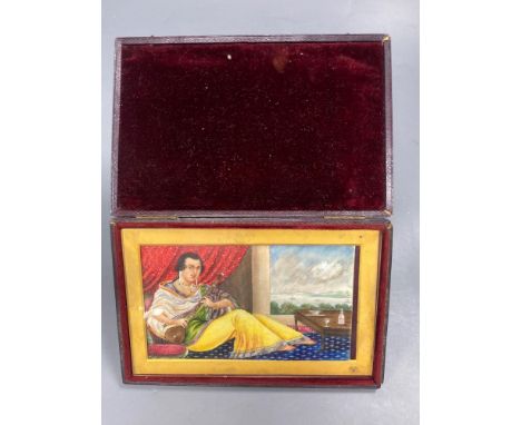 A late 19th century Indian School, gouache, lady playing a sitar
