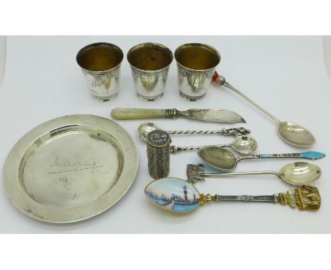 A Scottish silver card tray inscribed Marnie, enamel spoons, three shots, etc.