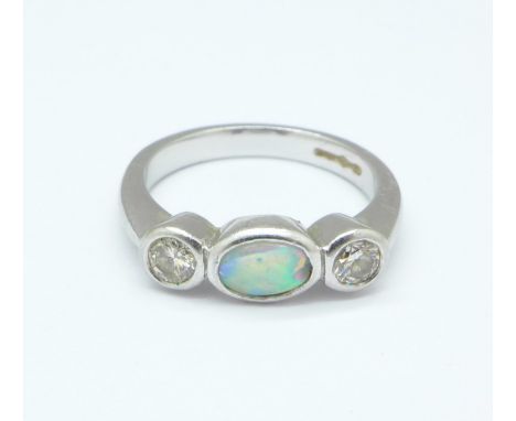 A platinum, opal and diamond ring, 5.8g, K