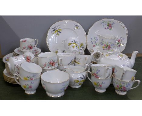 A Queen Anne Old Country Spray teaset; teapot, cream jug, sugar bowl, a large plate, six small plates, cups and saucers, Colc