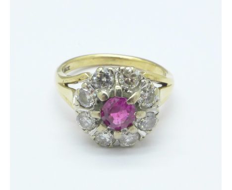 An 18ct gold, ruby and diamond cluster ring, 5.4g, M