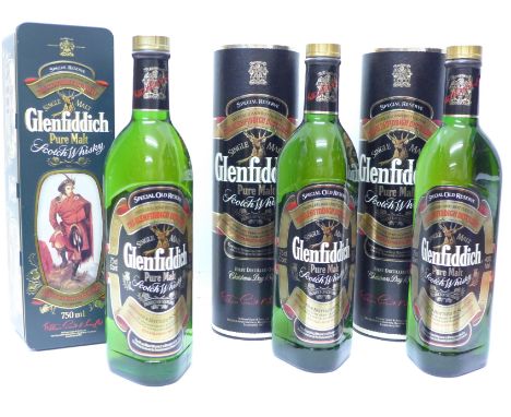 Three bottles of Glenfiddich Pure Malt Scotch Whisky, two in black presentation tubes, one in presentation tin
