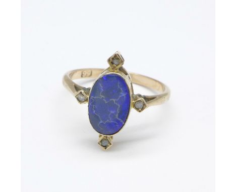 An early 20th Century Art Deco, crazed effect doublet opal ring, dark and bright blue stone, set with four small old cut diam