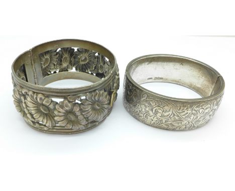 A hallmarked silver bangle and one other bangle