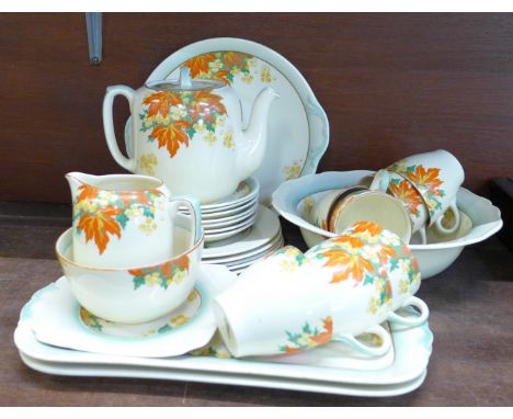 Royal Doulton Maple pattern teaware, D5302, including seven cups, seven saucers, teapot, cream and sugar, (27)