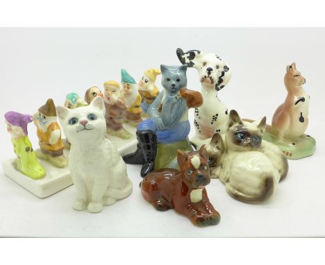 A Royal Doulton cat figure group, a Wade Collectors Club Dick Whittington figure, a Beswick cat figure, a/f, a Goebel dog fig