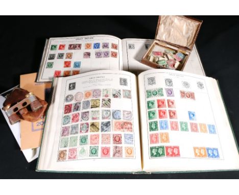 GB and World used stamp collection in two albums including GB embossed issues, George V 5 shilling seahorse, etc., many count