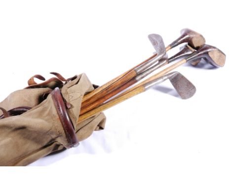Six hickory shafted golf clubs to include Thornton & Co Ltd "Wonder" L mashie, R Neilson of Musselburgh special L mashie, J A