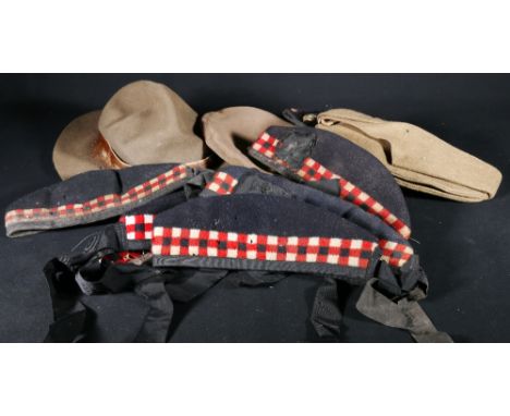 Seven Glengarry berets, two with badges, Wm Anderson and Sons KOSB beret another and a boy scouts hat with badgesProvenance C