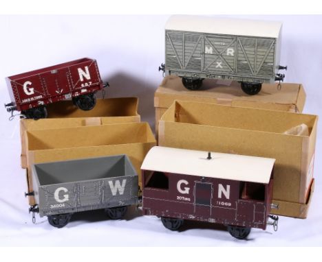 Bassett-Lowke GNR open wagon, Bassett-Lowke GWR open wagon, Bassett-Lowke GNR brake van 20 tons and Bassett-Lowke MR covered 