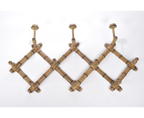 Simulated bamboo painted wood hat and coat rack, mid to late 19th centuryTo take three hats and seven coats.