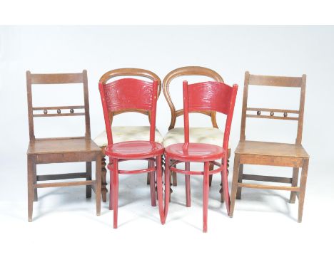 Six assorted chairs and a substantial rustic hardwood coffee tableTo include a pair of 19th Century oak country chairs with b