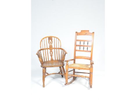 An 18th/19th Century elm and beech Windsor farmhouse chair and a spindle back rocking chairThe Windsor chair with a pierced c