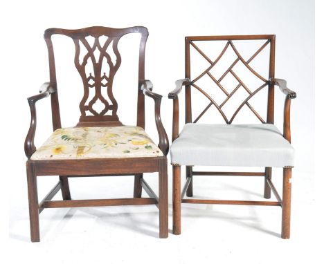 Two 19th century mahogany carver chairsThe first with an angular back with an open lattice work back panel above outswept arm