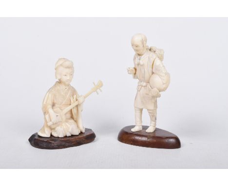 Two Japanese ivory Okimono, Meiji period Modelled as a bijin playing a shamisen dressed in robes, 10cm high, and another of a