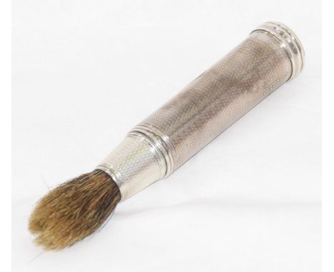 A Victorian silver shaving brushOf conventional cylindrical form, with engine turned decoration, crested, length 14.2cm, by B