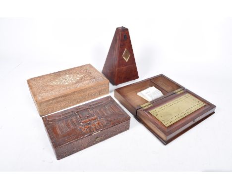 A mahogany portable cribbage box, early 20th centuryBox opening up to reveal a pierced brass plate for pins, further Asian bo