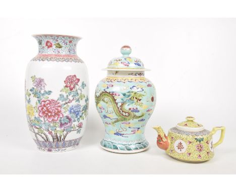 A collection of three Chinese famille rose itemsTo include a lidded turquoise ground lidded vase, 22cm high, a lemon yellow g