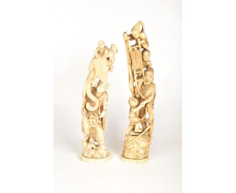 A matched pair of Japanese carved ivory tusk figures, late Meiji periodThe first carved with immortal figures and dragons, st