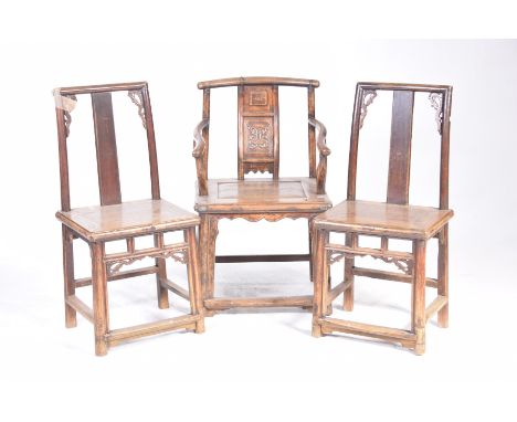 A Chinese hardwood Huanghuali style elbow chair and two similar side chairsThe elbow chair with a concave top rail above a sp
