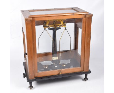 A model CB6 Stanton Instruments Ltd scales, early to mid-20th centuryHoused in a glazed case with lift-up door, width of case