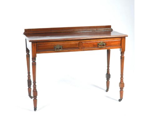 A Victorian mahogany side tableWith a rectangular moulded top above two drawers each with brass swing handles raised on ring 