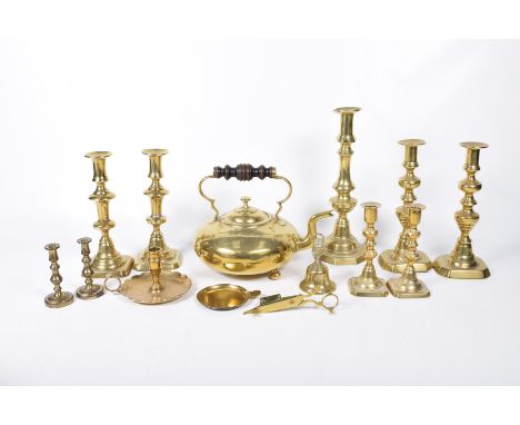 A collection of brass wareTo include Victorian knopped candlesticks, two smaller pairs of candlesticks, a chamber stick and a