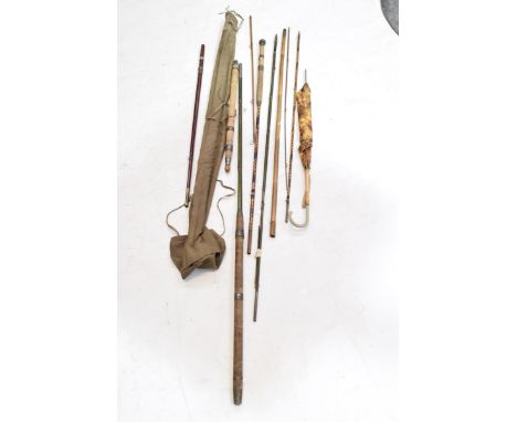 Two vintage fishing rods and a parasolEach within a canvas case.