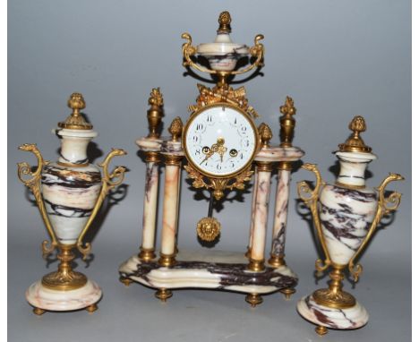A 19TH CENTURY FRENCH GREY VEINED MARBLE THREE PIECE GARNITURE comprising clock with eight day drum movement, urns and pineap