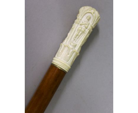 A SUPERB IVORY TOPPED OPIUM PIPE CANE, FRENCH, CIRCA. 1870.A wonderful opium pipe.  The bleached ivory is well carved in reli