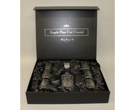 AN ARGYLE FINE CUT CRYSTAL WHISKEY DECANTER and six matching glasses, in a presentation case.
