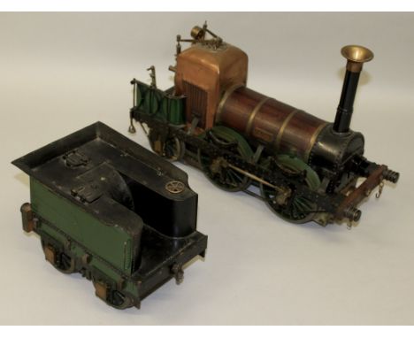 AN IRON, WOOD AND COPPER MODEL OF A STEAM ENGINE with nameplate LION, 16ins long, complete with TENDER, 8.5ins long.