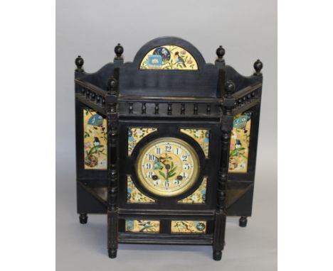 A GOOD VICTORIAN AESTHETIC MOVEMENT STAINED OAK CLOCK with eight day movement, the dial and case with lacquer panels of birds