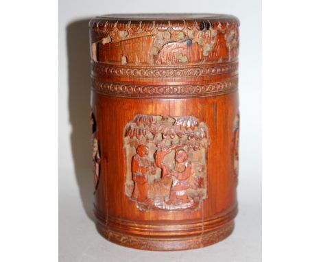 A 19TH/20TH CENTURY CHINESE BAMBOO JAR & COVER, the sides carved with relief panels of sages and of phoenix, 4.1in diameter a
