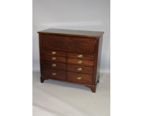 A GEORGE III MAHOGANY AND INLAID SECRETAIRE CHEST with a deep secretaire drawer, fitted with small drawers, a door and pigeon