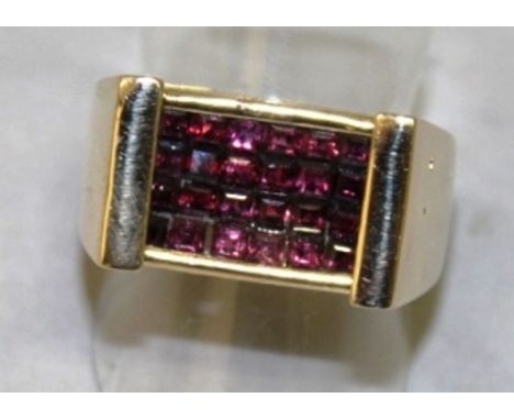 AN 18CT YELLOW GOLD AND RUBY TABLET RING.