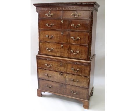 A GOOD GEORGE III MAHOGANY TALLBOY with Greek key and blink fret cornice, two short and three long drawers flanked by canted 
