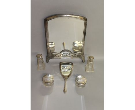 AN AUSTRIAN ART DECO STANDING MIRROR stamped ARGENTOR, a hand mirror, a pair of glass bottles and a pair of scent bottles.