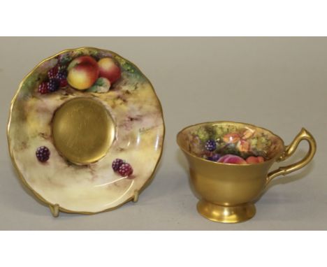 A ROYAL WORCESTER COFFEE CAN AND SAUCER painted by E. TOWNSEND.