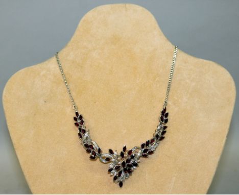 A SUPERB WHITE GOLD, RUBY AND DIAMOND NECKLACE.