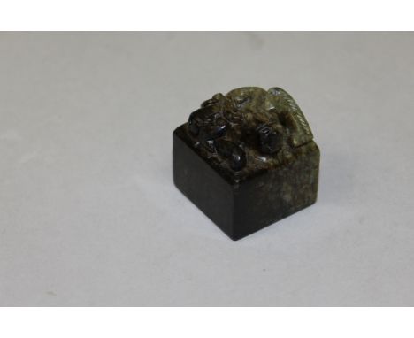 A CARVED SQUARE CHINESE SEAL.  1.5ins.