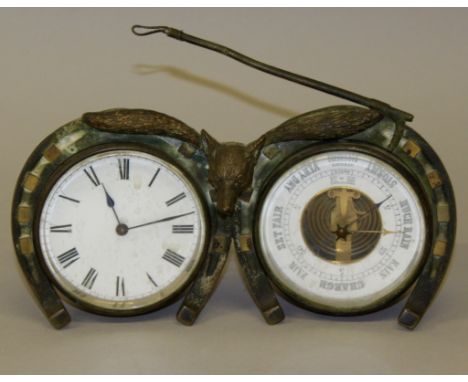 A DUEL CLOCK AND BAROMETER, each 3.5ins diameter, in a brass hunting case with two shoehorns, fox and whip, 9.5ins wide.