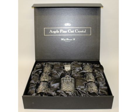 AN ARGYLE FINE CUT CRYSTAL WHISKEY DECANTER and six matching glasses, in a presentation case.