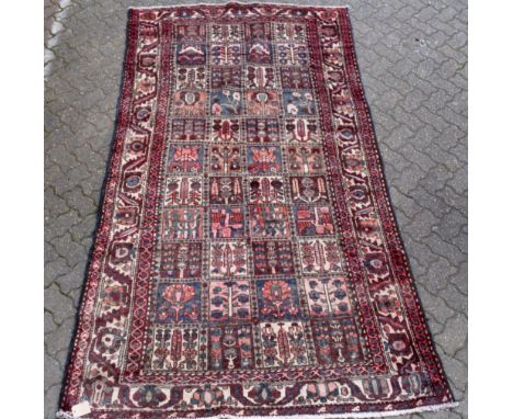 A Hamadan Bakhtiar garden design carpet. 9ft 7ins x 5ft 1ins.