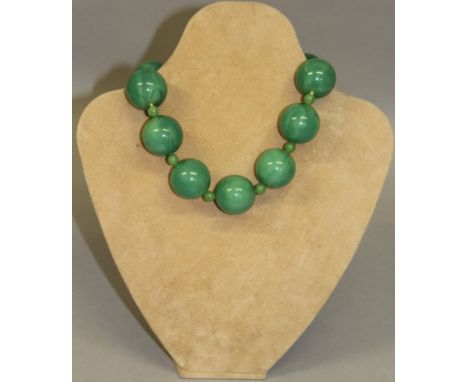 A LARGE JADE STONE NECKLACE.